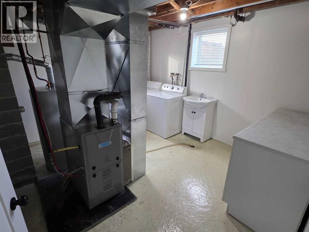 5105 54 Avenue, Taber, Alberta  T1G 1M2 - Photo 19 - A2283168