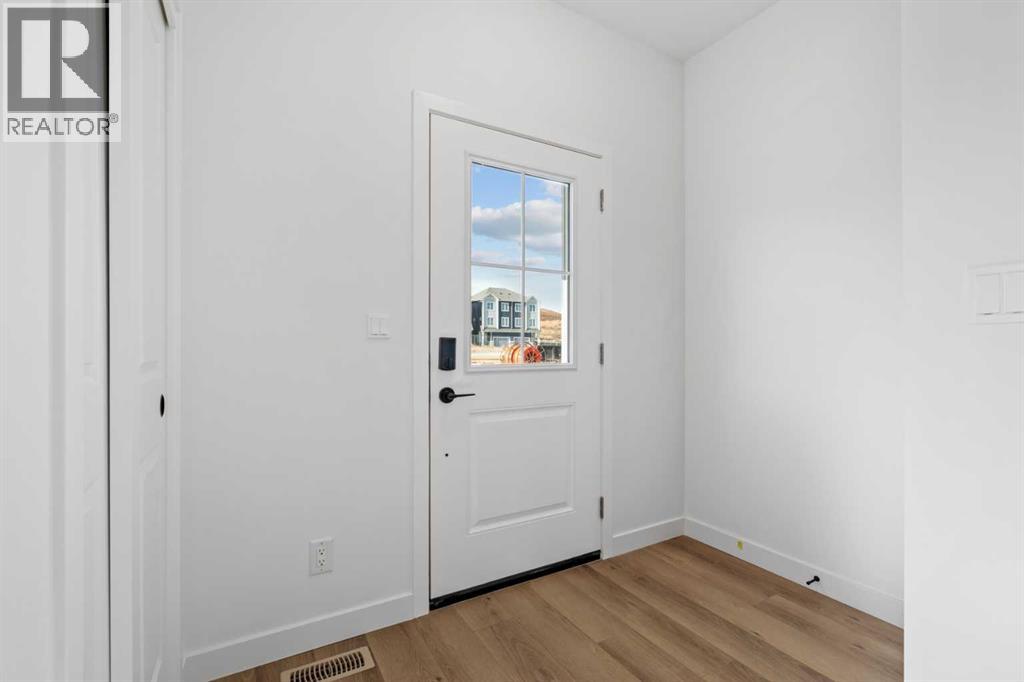 1115, 25 Wildwoods Court Sw, Airdrie, Alberta  T4B 5V7 - Photo 2 - A2283791