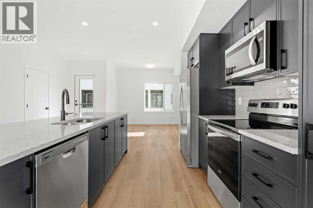 1115, 25 Wildwoods Court Sw, Airdrie, Alberta  T4B 5V7 - Photo 6 - A2283791