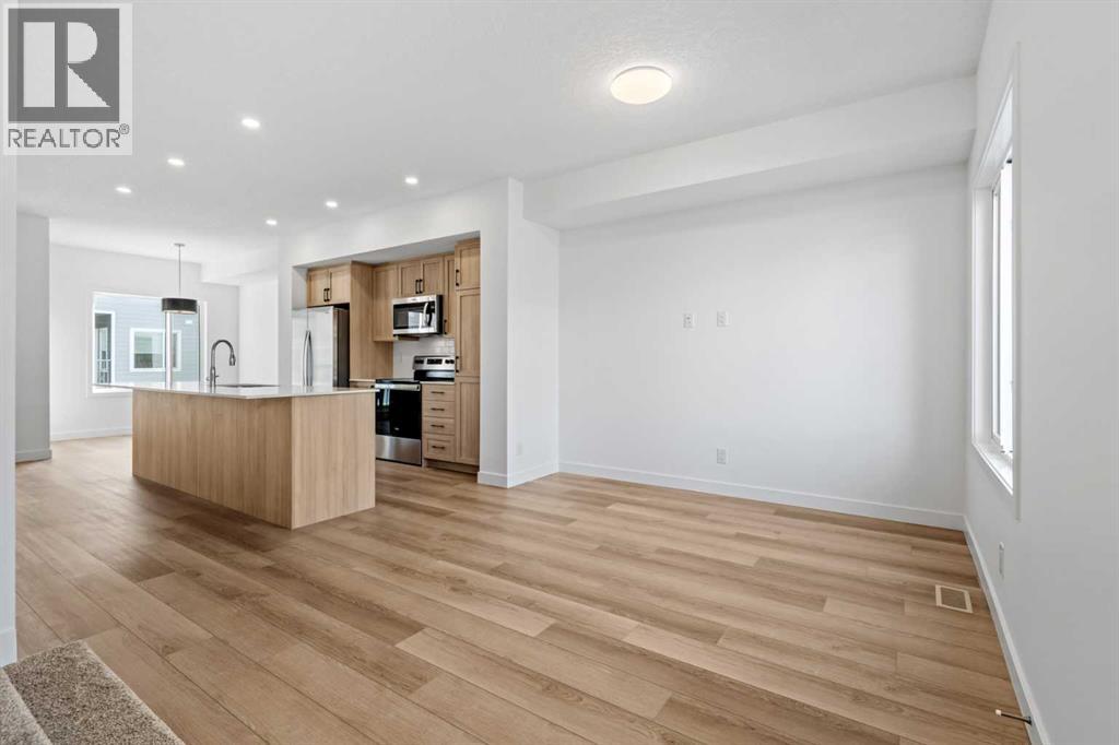 1007, 25 Wildwoods Court Sw, Airdrie, Alberta  T4B 5V7 - Photo 4 - A2283457