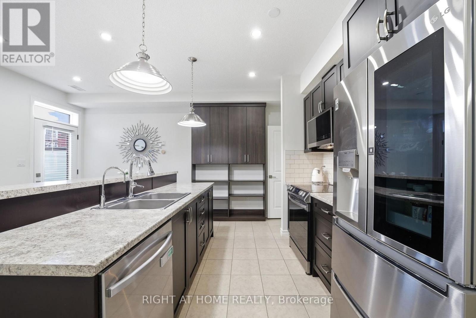 128 - 445 Ontario Street S, Milton, Ontario  L9T 9K4 - Photo 11 - W12839802