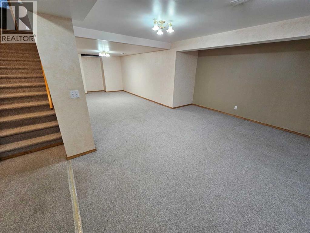 302 Meadowbrook Bay Se, Airdrie, Alberta  T4A 2B2 - Photo 23 - A2233014