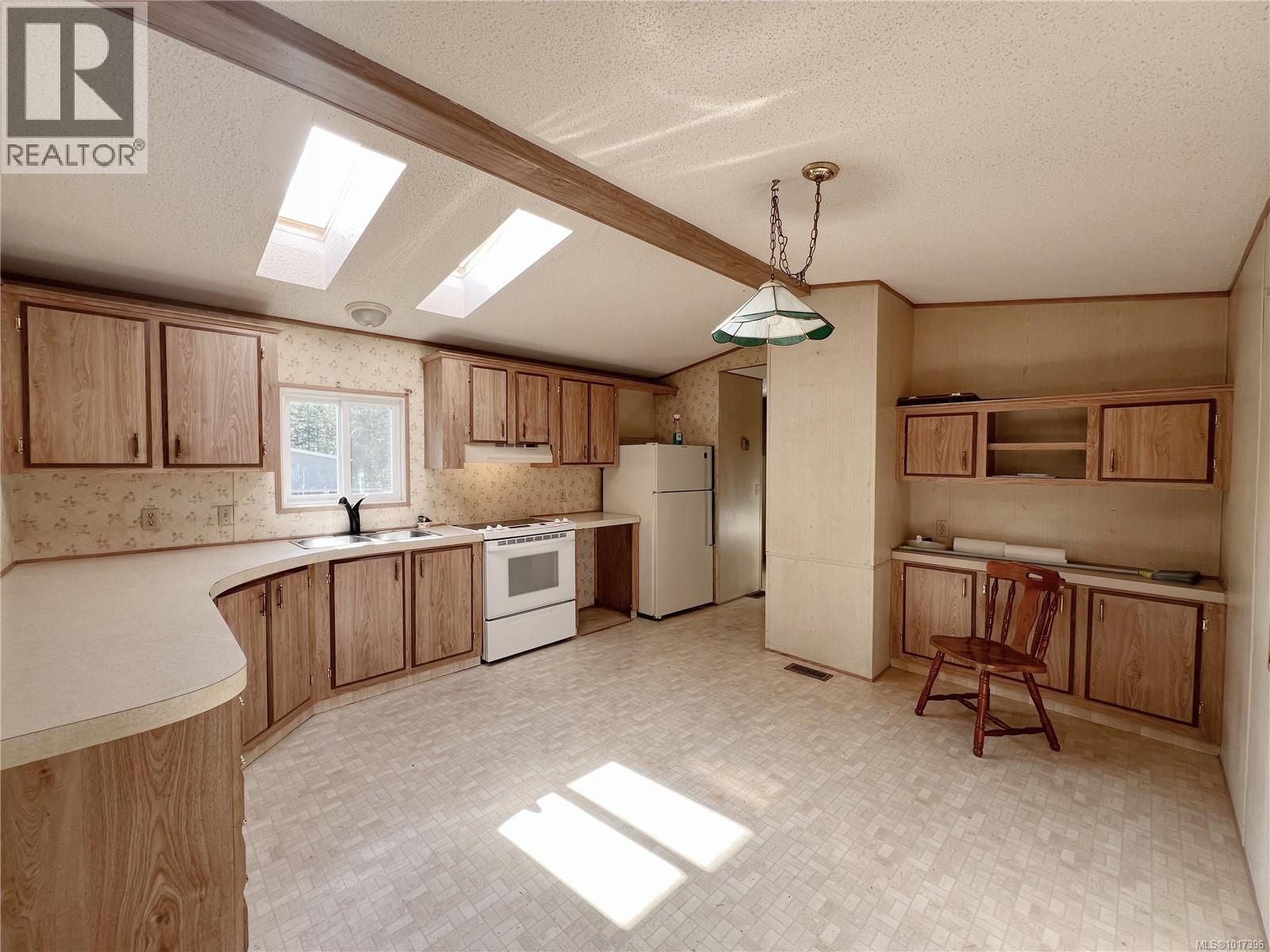 602 Matchlee Dr, Gold River, British Columbia  V0P 1G0 - Photo 2 - 1017396