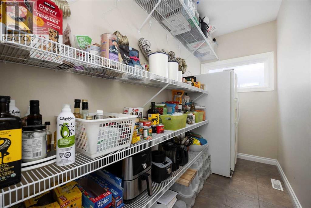 140 Heron Place, Fort Mcmurray, Alberta T9K 0P7 - Photo 7 - A2284827