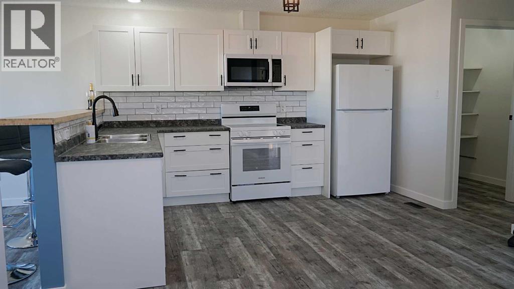 4907 53 Avenue, Kitscoty, Alberta  T0B 2P0 - Photo 9 - A2269030