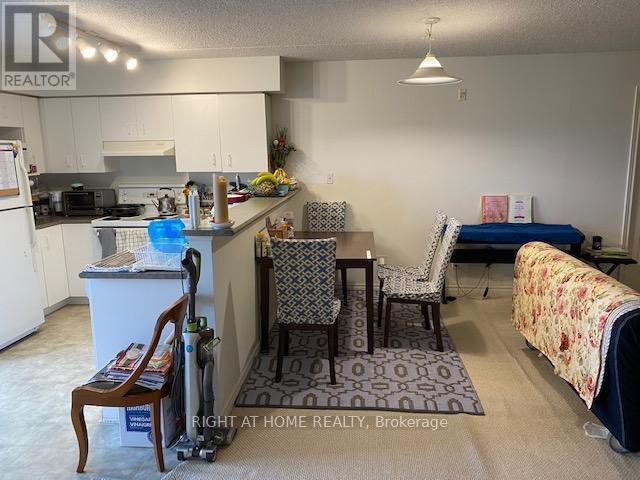 310 - 1460 Bishops Gate, Oakville, Ontario  L6M 4N5 - Photo 3 - W12840768