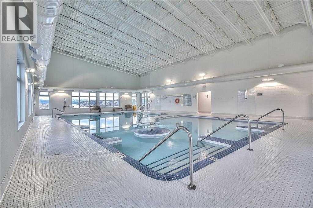 609 Cottageclub Bend, Rural Rocky View County, Alberta  T4C 1B1 - Photo 8 - A2277320