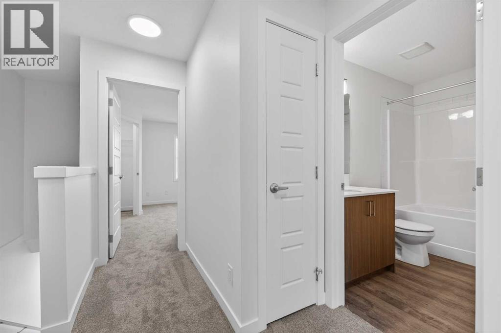 56 Creekside Drive Sw, Calgary, Alberta  T2X 6E2 - Photo 17 - A2282815