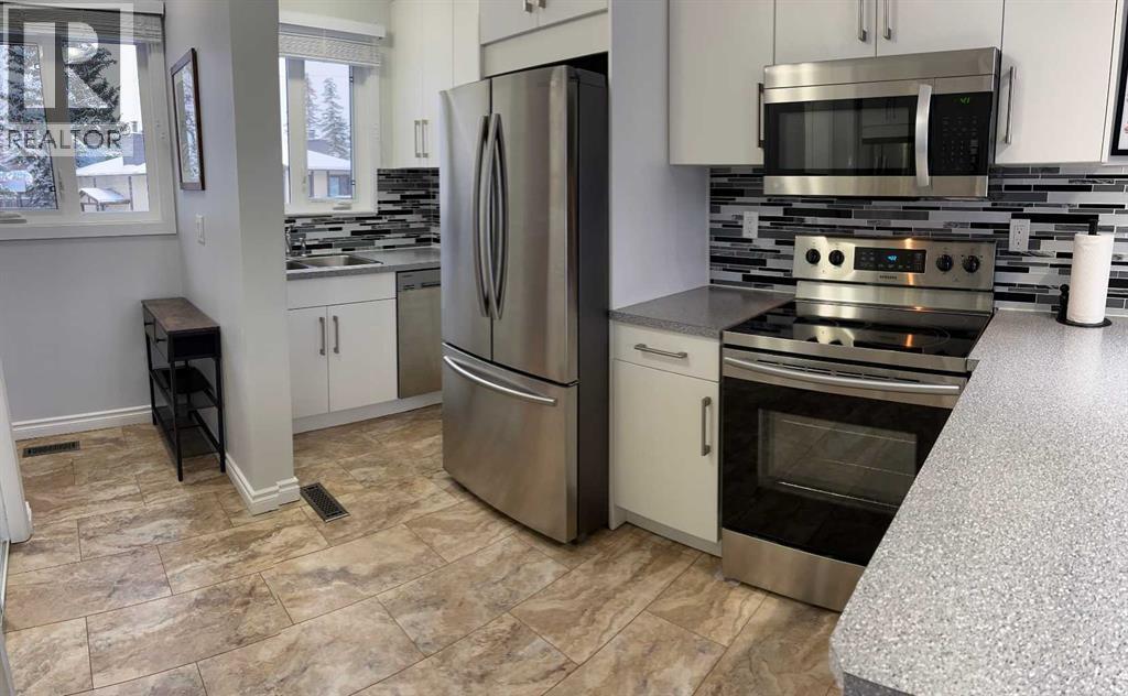 65 Storybook Gardens Nw, Calgary, Alberta  T3G 1Y7 - Photo 5 - A2289291