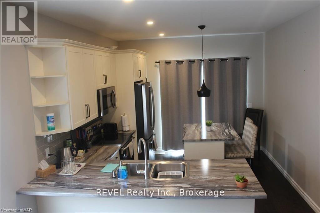 438 Mcalpine Avenue N, Welland, Ontario  L3B 1T3 - Photo 7 - X12841116