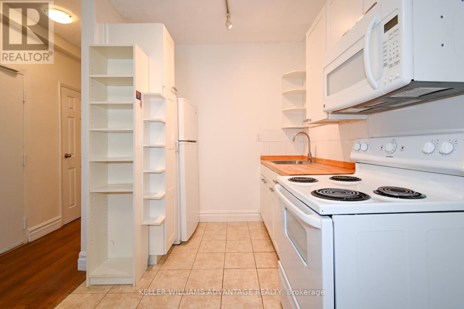 A - 242 Highfield Road, Toronto, Ontario  M4L 2V5 - Photo 8 - E12841490