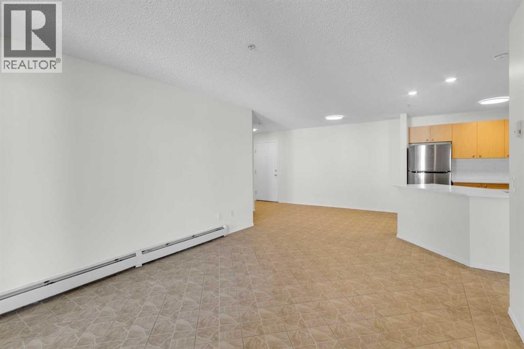 104, 16 Country Village Bay Ne, Calgary, Alberta  T3K 5Y9 - Photo 9 - A2289125