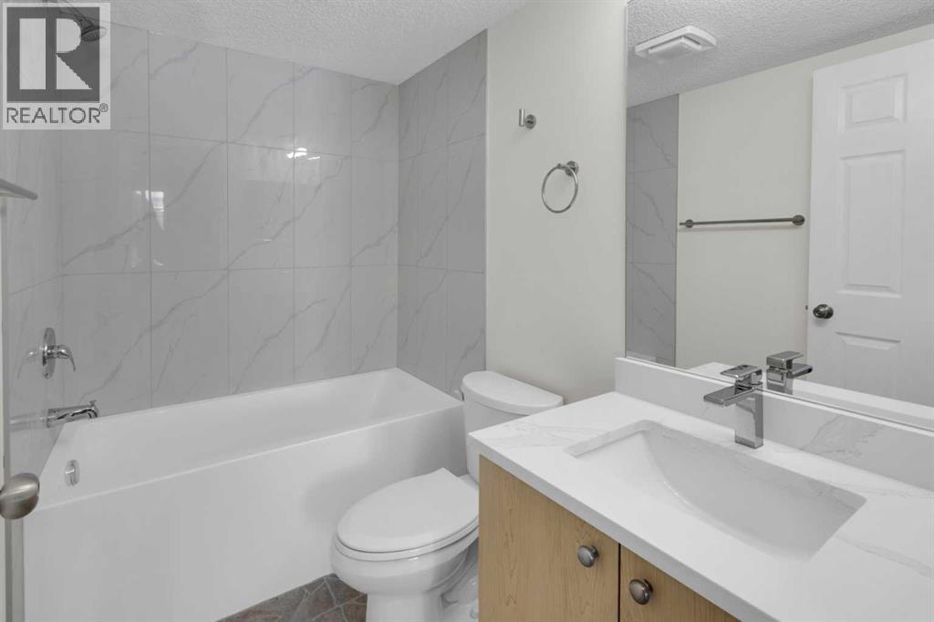 104, 16 Country Village Bay Ne, Calgary, Alberta  T3K 5Y9 - Photo 18 - A2289125
