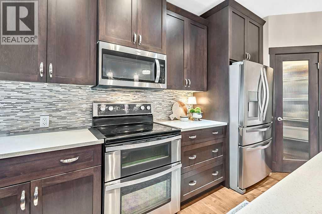 112 Kinniburgh Close, Chestermere, Alberta  T1X 0R8 - Photo 7 - A2281468