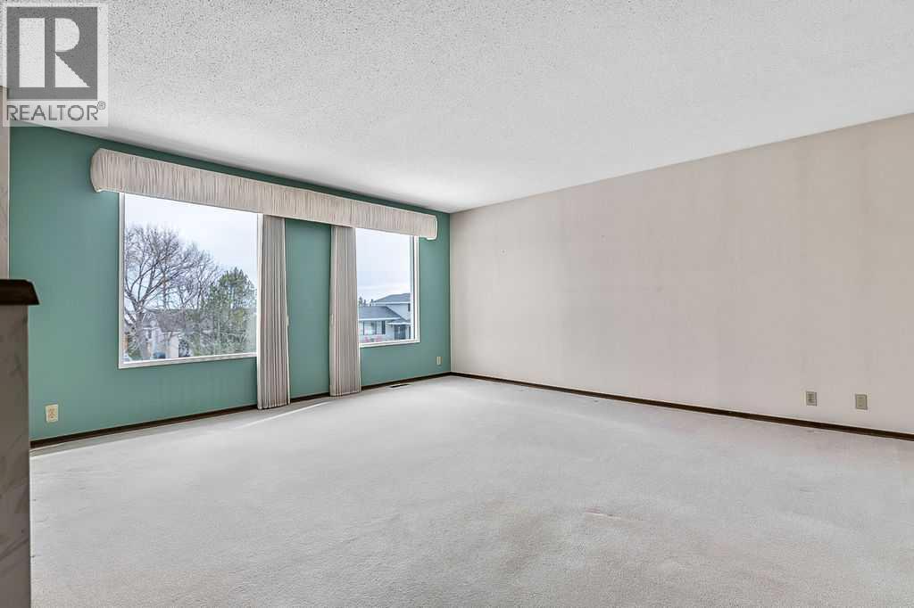 6135 Thornaby Way Nw, Calgary, Alberta  T2K 5K7 - Photo 5 - A2288920