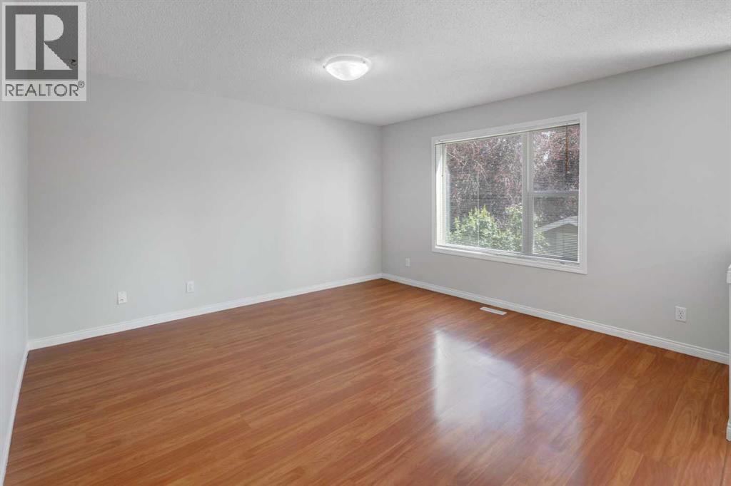 26 Rocky Ridge Heights Nw, Calgary, Alberta  T3G 4J6 - Photo 7 - A2257305