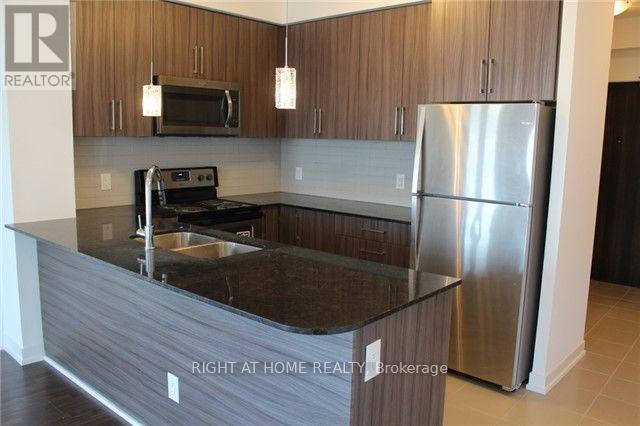 1407 - 840 Queens Plate Drive, Toronto (West Humber-Clairville), Ontario  M9W 6Z3 - Photo 9 - W12840370