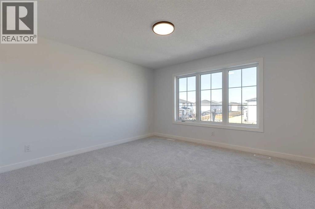 95 Southborough Crescent, Cochrane, Alberta T4C 3J3 - Photo 18 - A2285095