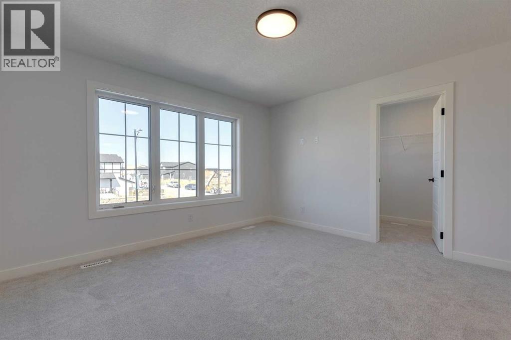 95 Southborough Crescent, Cochrane, Alberta T4C 3J3 - Photo 20 - A2285095