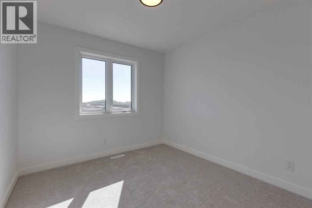 95 Southborough Crescent, Cochrane, Alberta T4C 3J3 - Photo 15 - A2285095