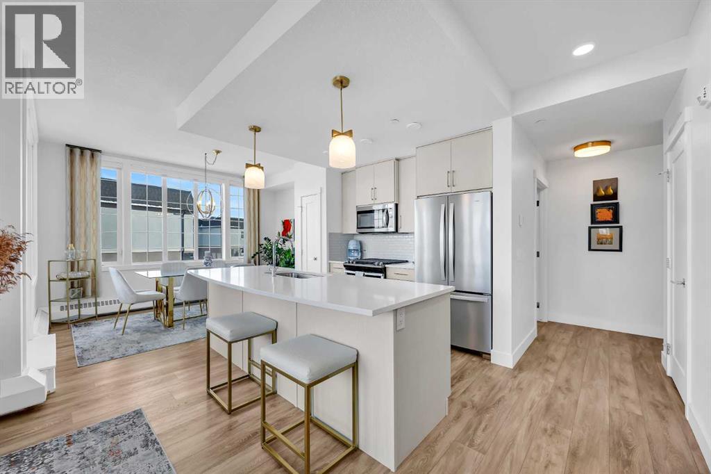 210, 38 Quarry Gate Se, Calgary, Alberta T2C 5T6 - Photo 4 - A2276029