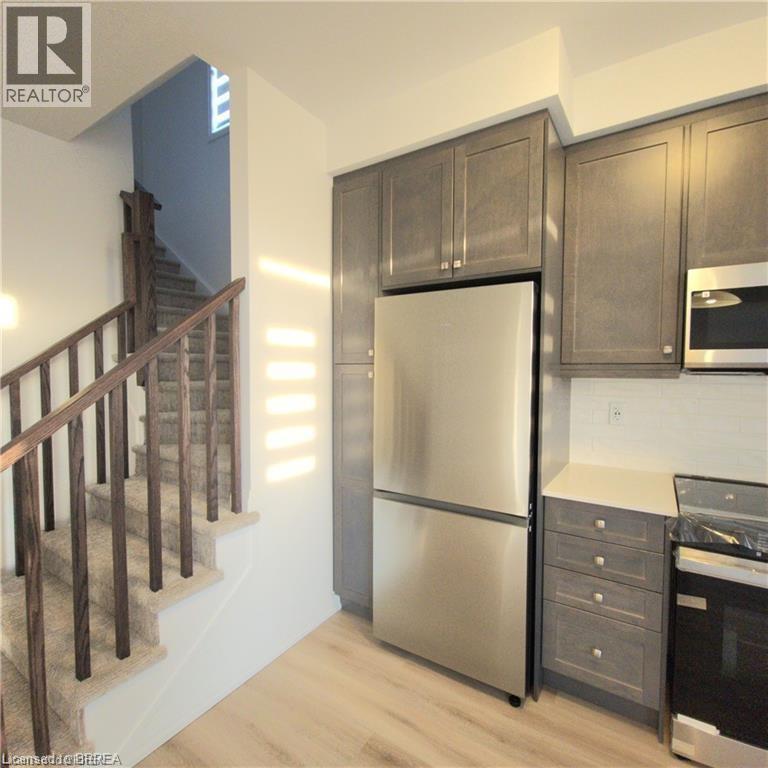 55 Tom Brown Drive Unit# 24, Paris, Ontario  N3L 0N5 - Photo 2 - 40809303