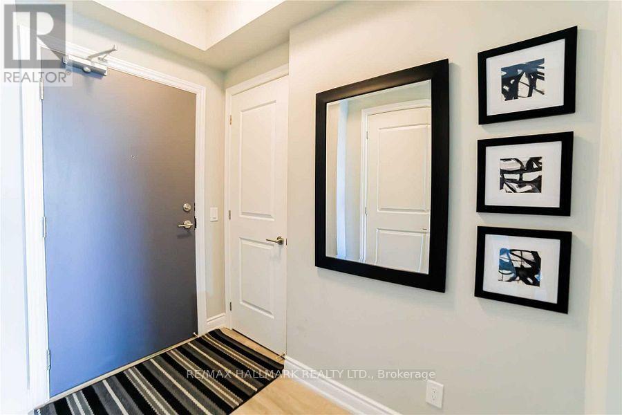 1015 - 9618 Yonge Street, Richmond Hill, Ontario  L4C 0X5 - Photo 2 - N12842862