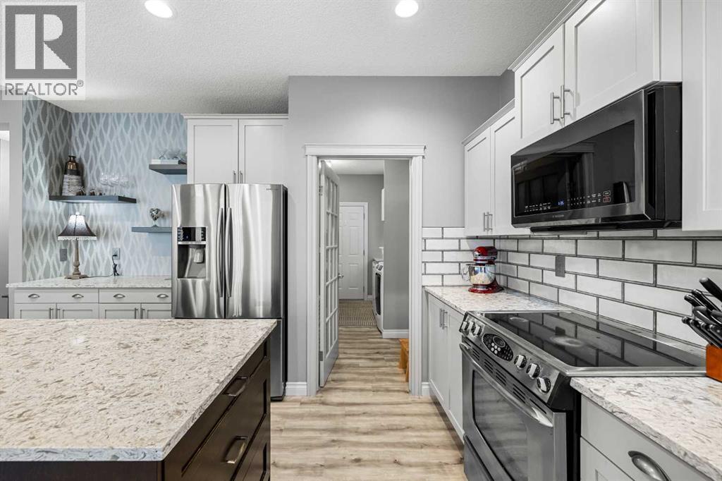 210 Hidden Creek Heights Nw, Calgary, Alberta  T3A 6K8 - Photo 12 - A2289863