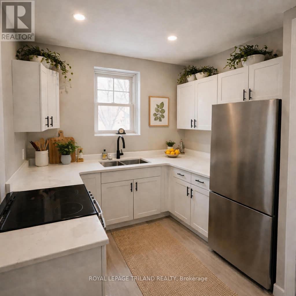 Unit 2 - 181 Ridout Street S, London South, Ontario  N6C 3X8 - Photo 4 - X12601354