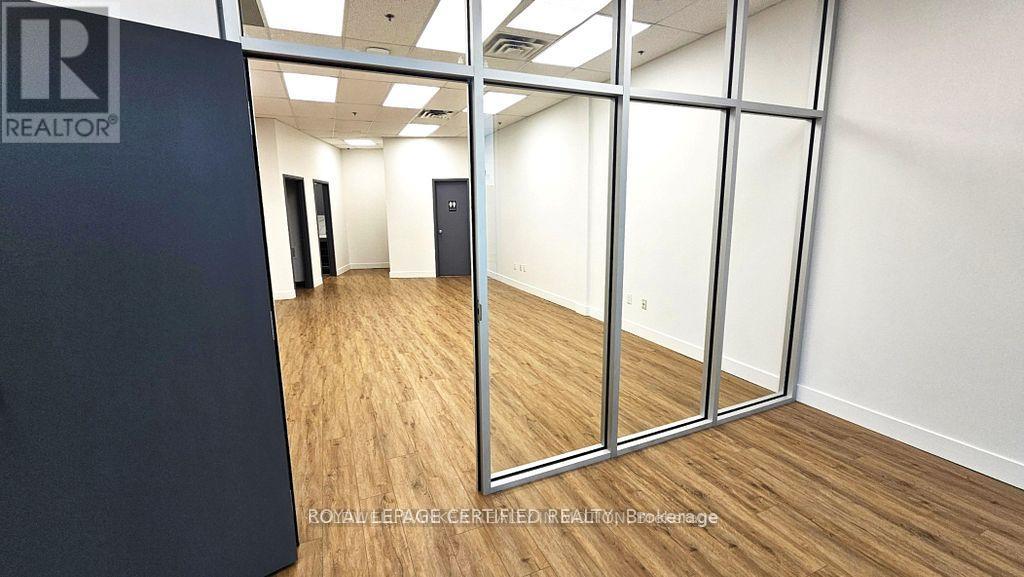 115 - 1660 North Service Road, Oakville, Ontario  L6H 7G3 - Photo 3 - W12843054