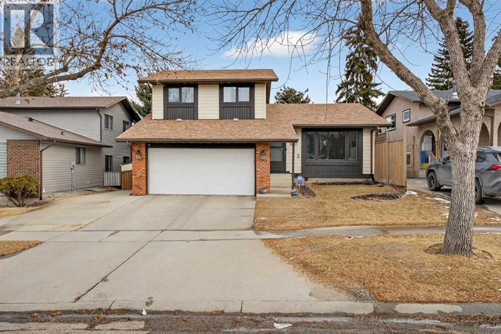 1480 Berkley Drive Nw, Calgary, Alberta  T3k 1T8 - Photo 1 - A2283274