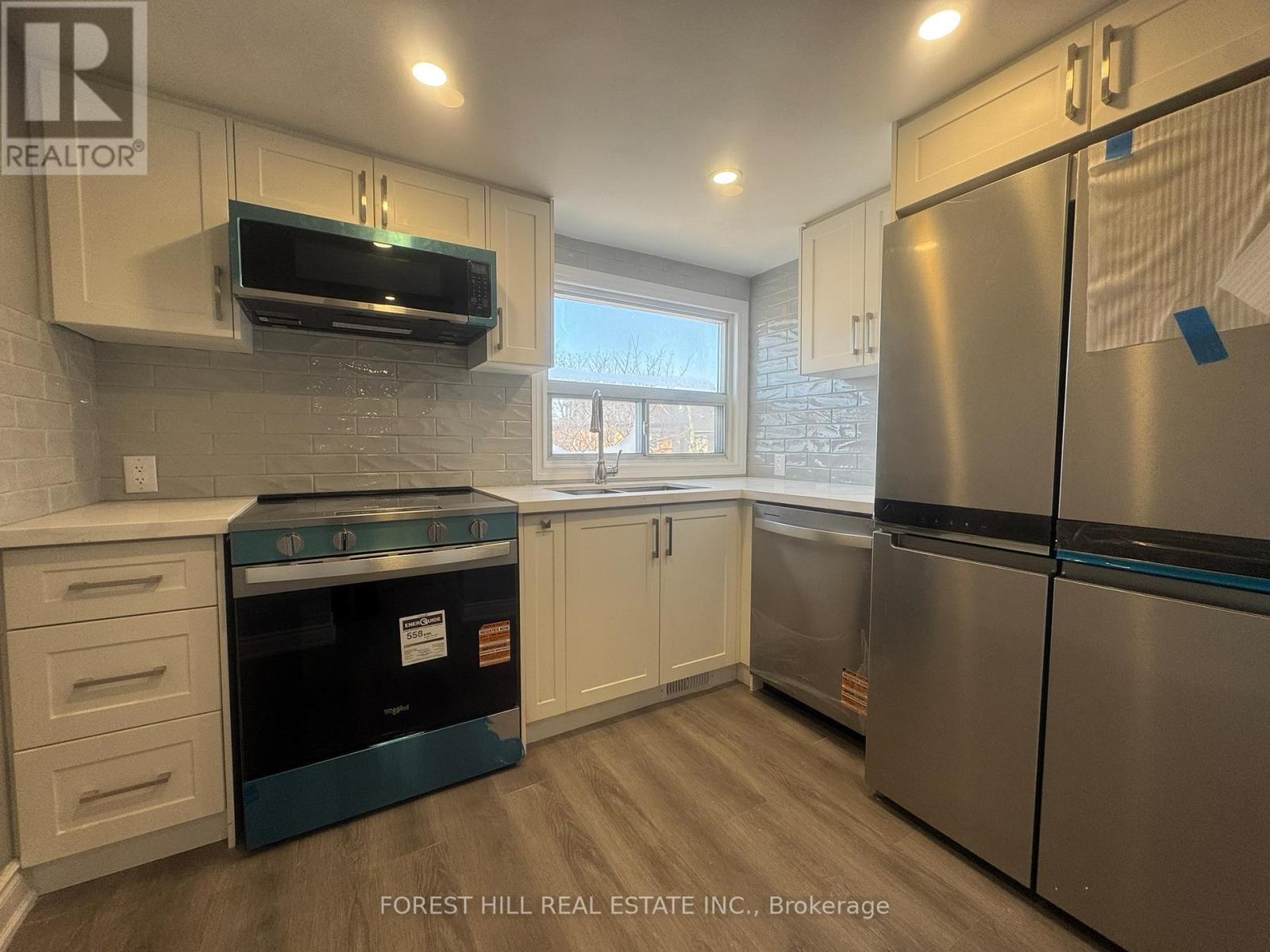 32 Earlscourt Avenue, Toronto, Ontario  M6E 4A6 - Photo 3 - W12843226