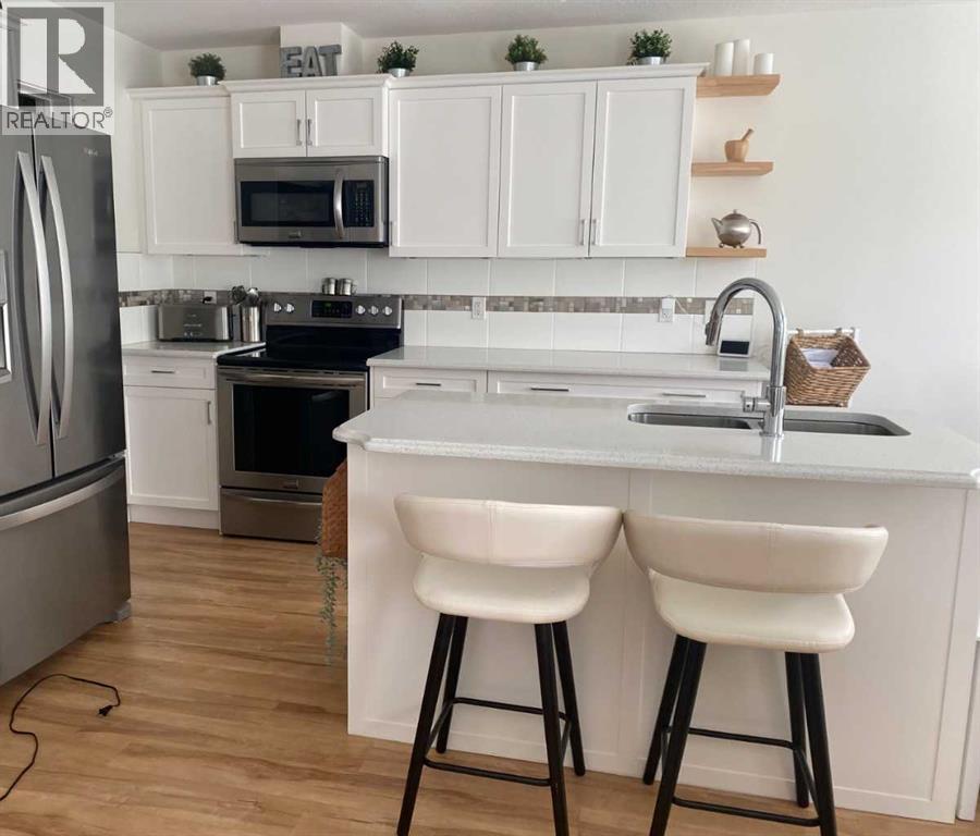 151 Kingsbridge Road Se, Airdrie, Alberta  T4A 0M2 - Photo 5 - A2288986