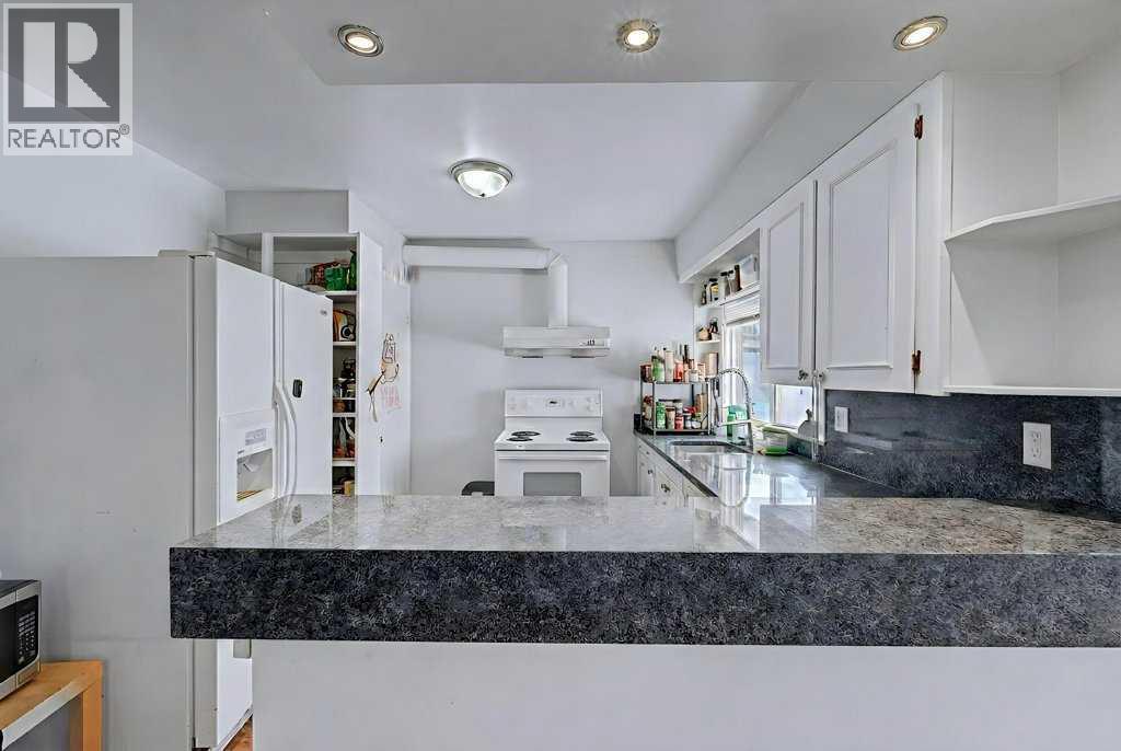 904 38 Street Sw, Calgary, Alberta  T3C 1T3 - Photo 3 - A2290171