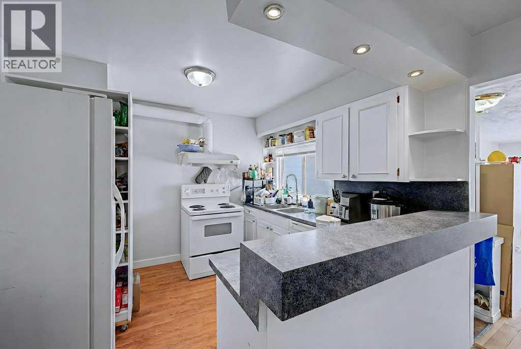 904 38 Street Sw, Calgary, Alberta  T3C 1T3 - Photo 4 - A2290171