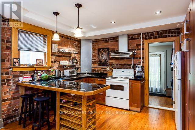 Main - 56 Macdonell Avenue, Toronto (Roncesvalles), Ontario  M6R 2A2 - Photo 4 - W12844276