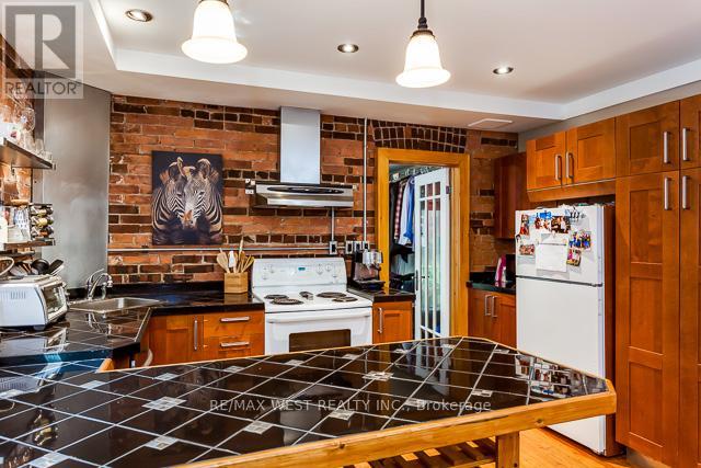 Main - 56 Macdonell Avenue, Toronto (Roncesvalles), Ontario  M6R 2A2 - Photo 5 - W12844276