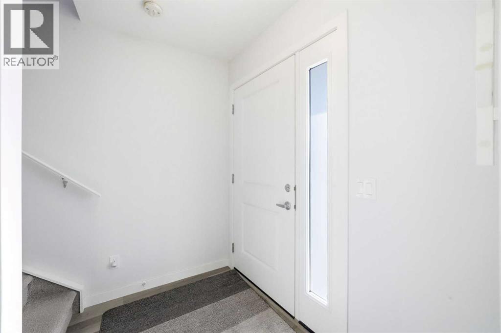 66 Evanscrest Manor Nw, Calgary, Alberta  T2P 2A3 - Photo 3 - A2286969