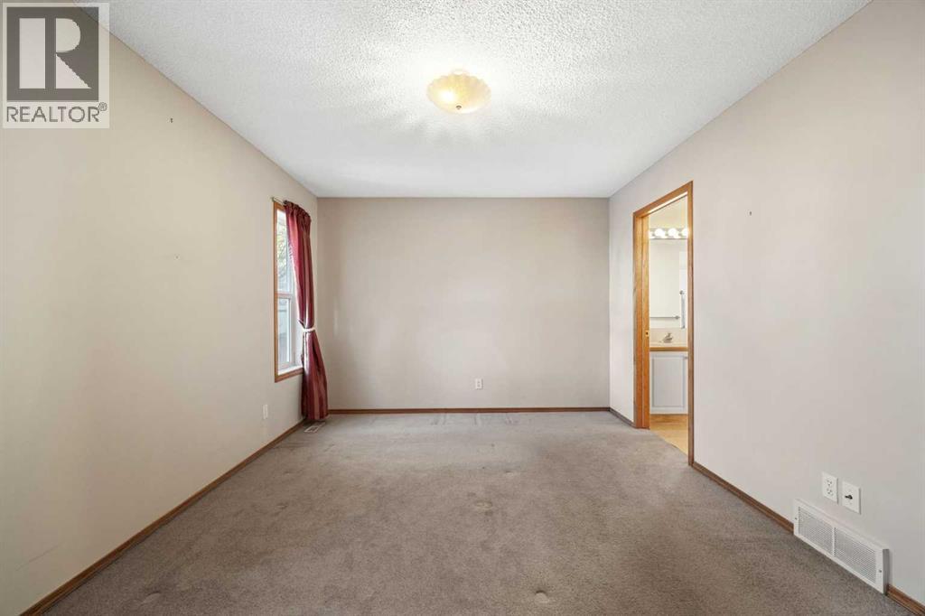 220 Sunset Place, Okotoks, Alberta  T1S 1P3 - Photo 18 - A2268466