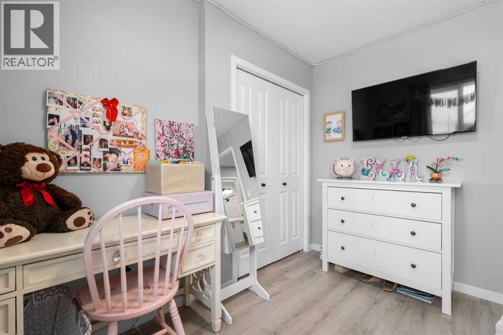 92 Wolf Gate, Okotoks, Alberta  T1S 5T9 - Photo 20 - A2288264