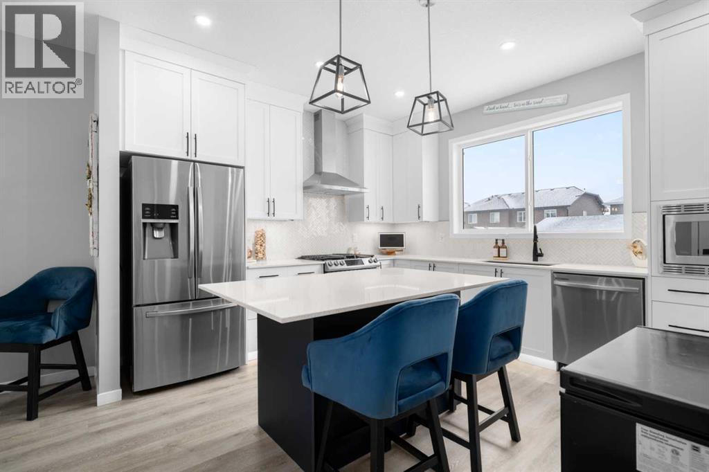 92 Wolf Gate, Okotoks, Alberta  T1S 5T9 - Photo 6 - A2288264