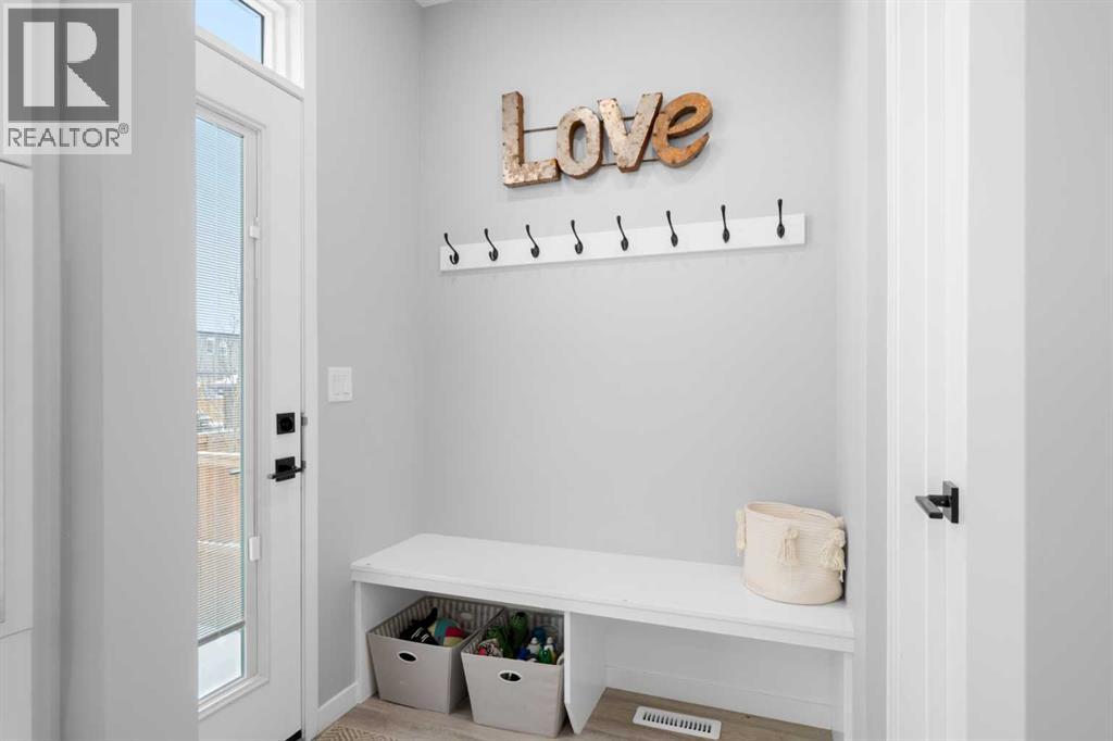 92 Wolf Gate, Okotoks, Alberta  T1S 5T9 - Photo 8 - A2288264