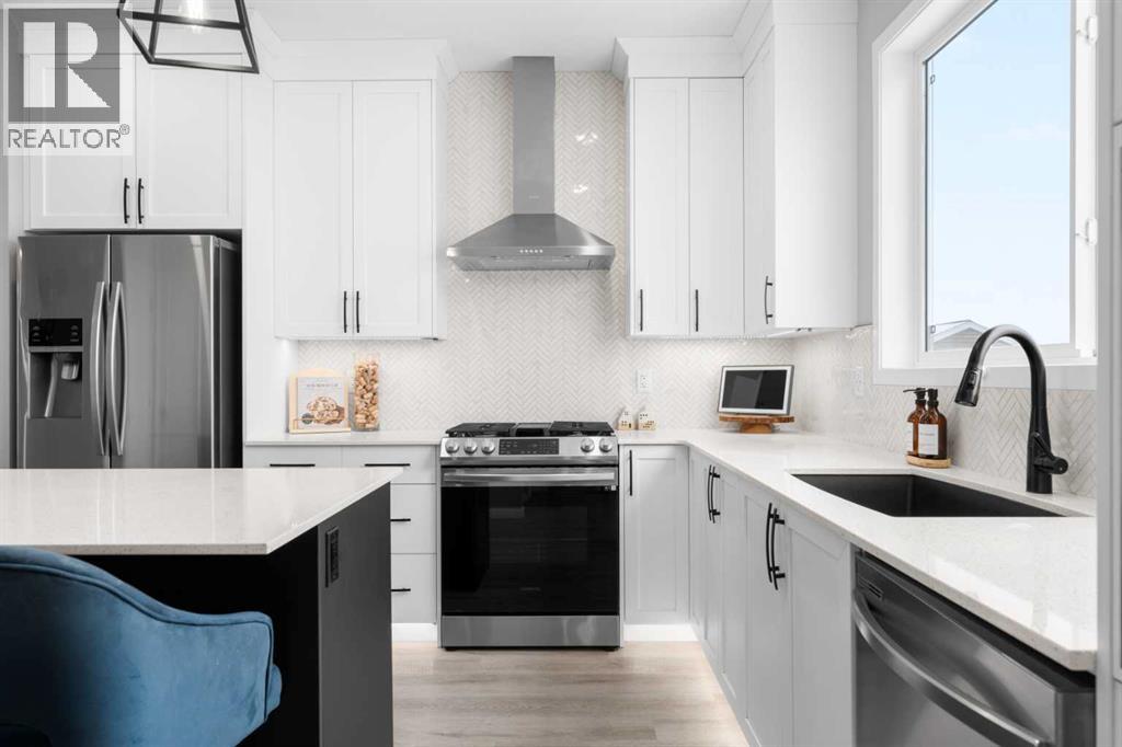 92 Wolf Gate, Okotoks, Alberta  T1S 5T9 - Photo 7 - A2288264