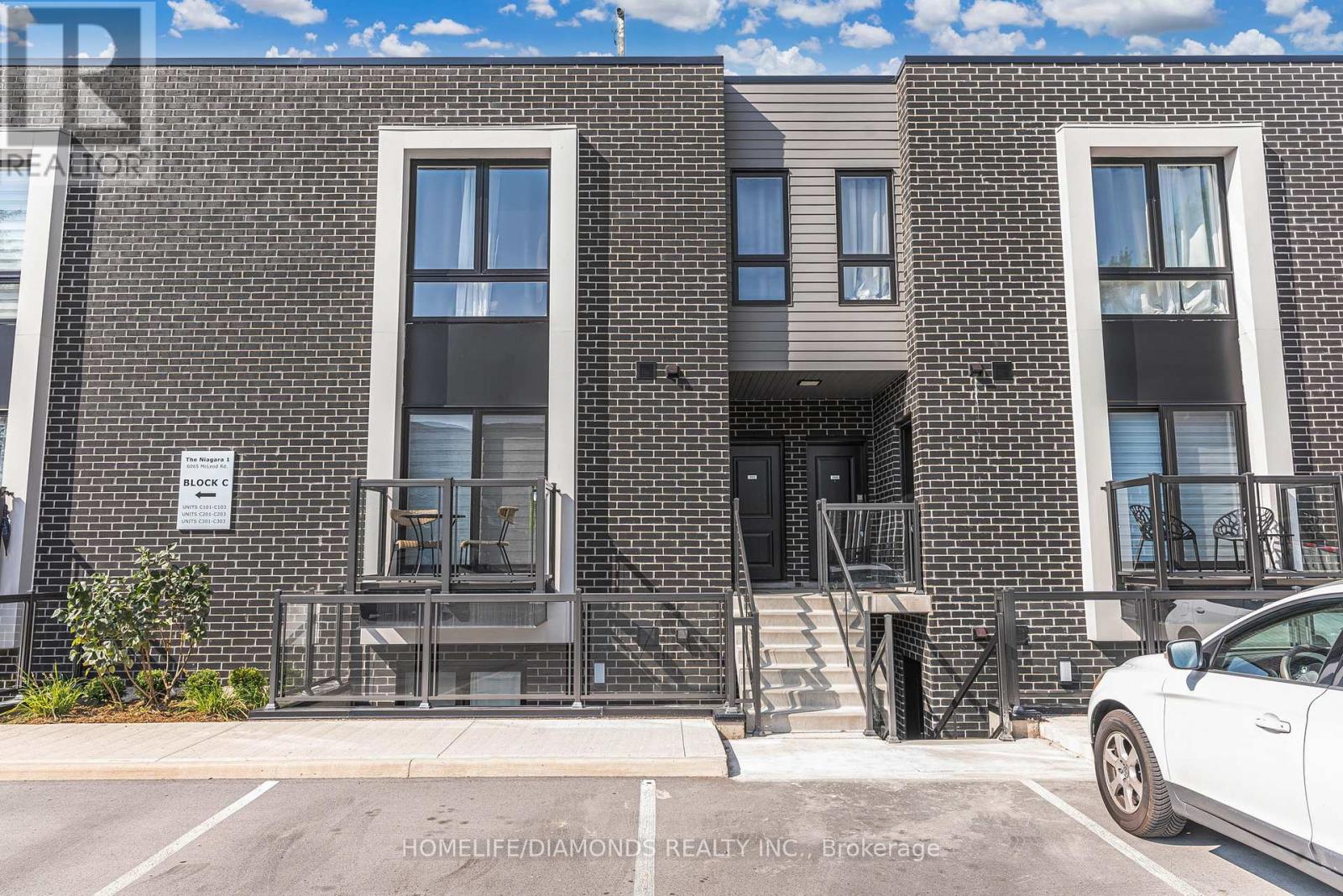 203 - 6065 Mcleod Road, Niagara Falls, Ontario L2G 0Z7 - Photo 1 - X12845056