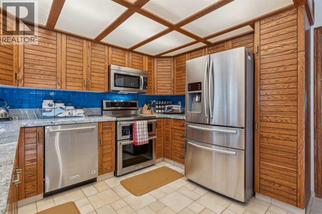 9948 Patton Road Sw, Calgary, Alberta  T2V 5G1 - Photo 5 - A2290556