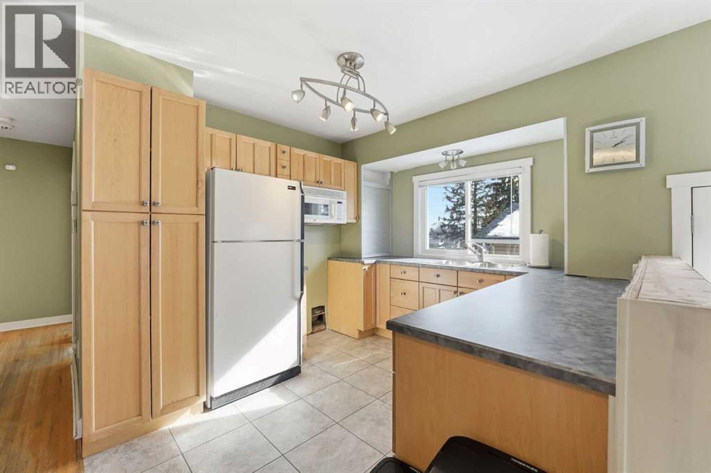 1 Thorncliffe Crescent Nw, Calgary, Alberta  T2K 3A9 - Photo 10 - A2290536