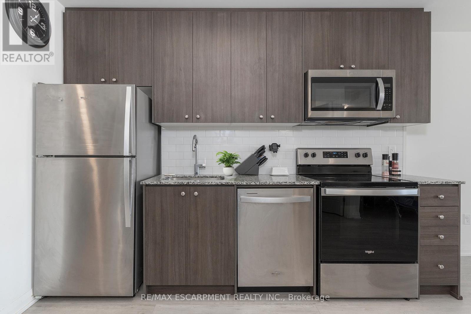 311 - 1415 Dundas Street E, Oakville, Ontario  L6H 8A3 - Photo 5 - W12845426