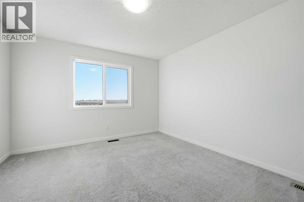 305 Hillcrest Road Sw, Airdrie, Alberta  T4B 4K1 - Photo 20 - A2285814