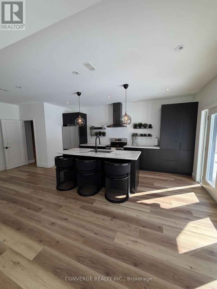 Basement Unit - 10 Sweet Cicely Street, Springwater, Ontario  L9X 2E2 - Photo 2 - S12846348