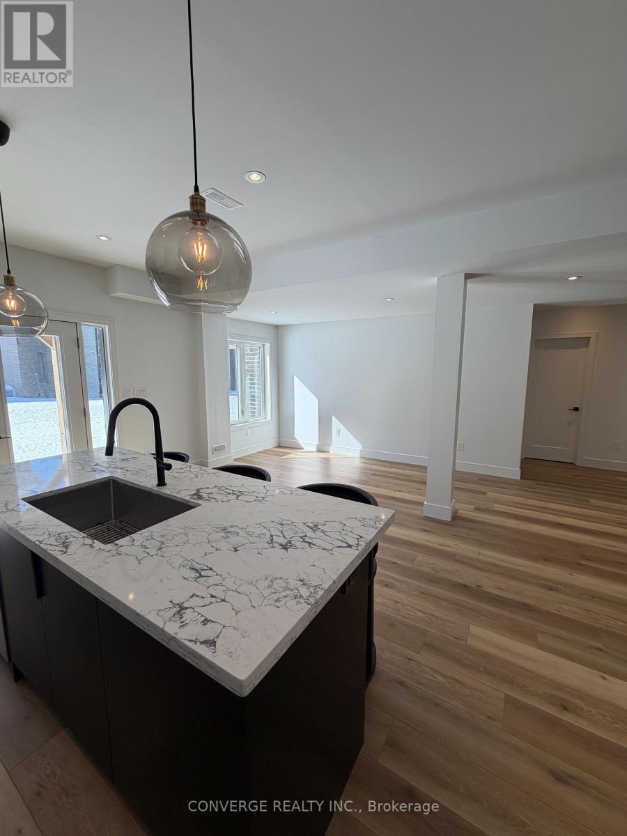 Basement Unit - 10 Sweet Cicely Street, Springwater, Ontario  L9X 2E2 - Photo 3 - S12846348